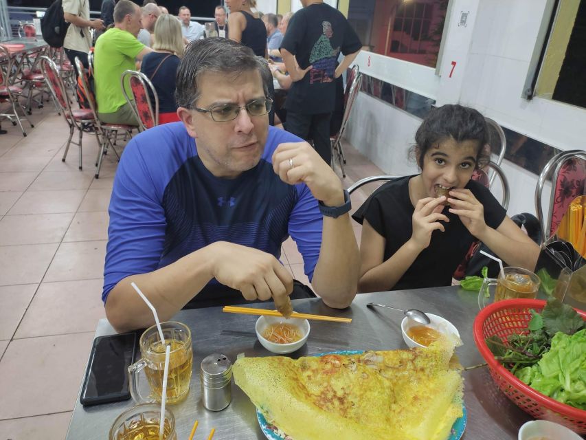 Saigon: Night Sightseeing And Street Food Tour By Vespa - Seafood restaurant finale with beer and snails