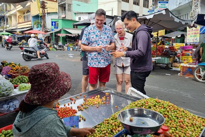 Saigon Private/Small Group Walking Food Tour with 13 Tastings - District 10 Savory Pancake and Herb-Heavy Bites