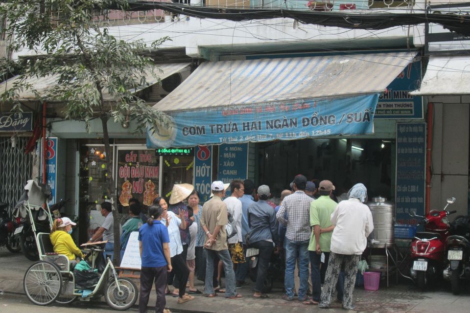 Saigon Slum Tour with Motorbike - Old mafia area to the river: districts 5–7 and lives shaped by water
