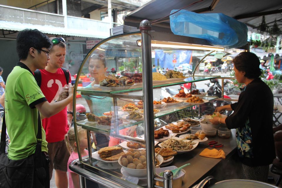 Saigon: Street Food Evening Walking Tour - Steamed rice rolls cooking lesson: the best hands-on stop