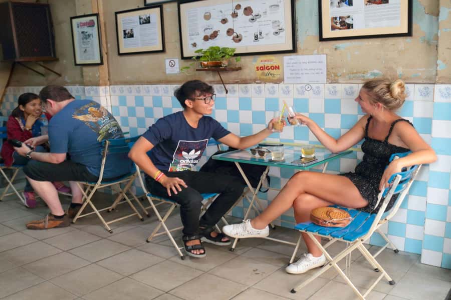 Saigon Unseen: Culture, Coffee &Hidden Corner Motorbike Tour - Riding past communist-era apartments to Ten Thousand Buddhas Monastery