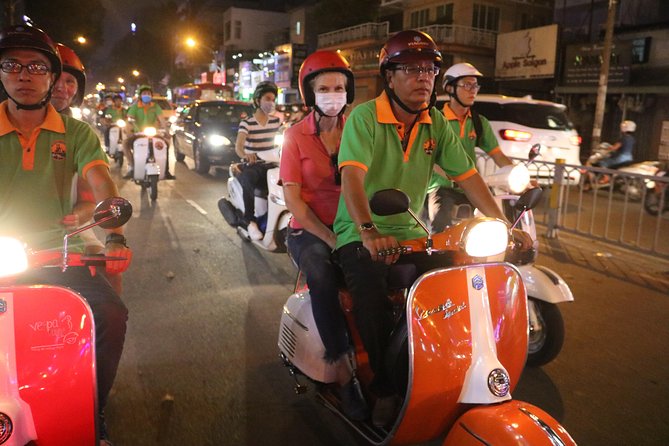 Saigon Vespa By Night Street Food Tour 4,5 Hours - Ho Chi Minh Square: your first big night landmark