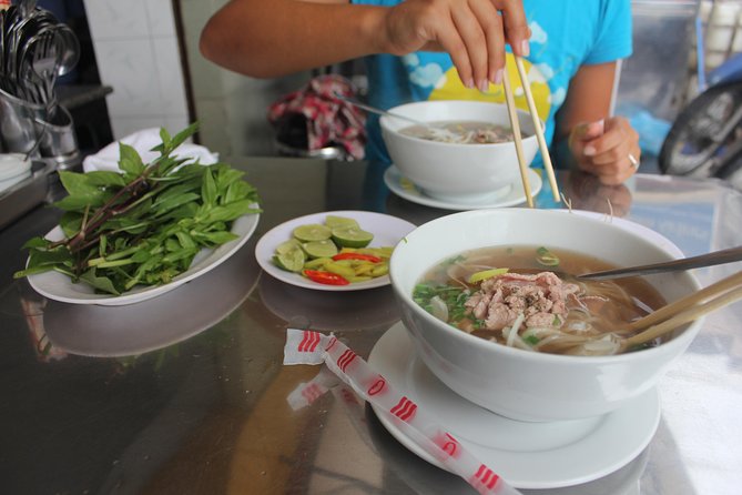 Small-group Street Food Lover by Motorbike (04 hours) - Hotel pickup, timing, and how the tour actually starts