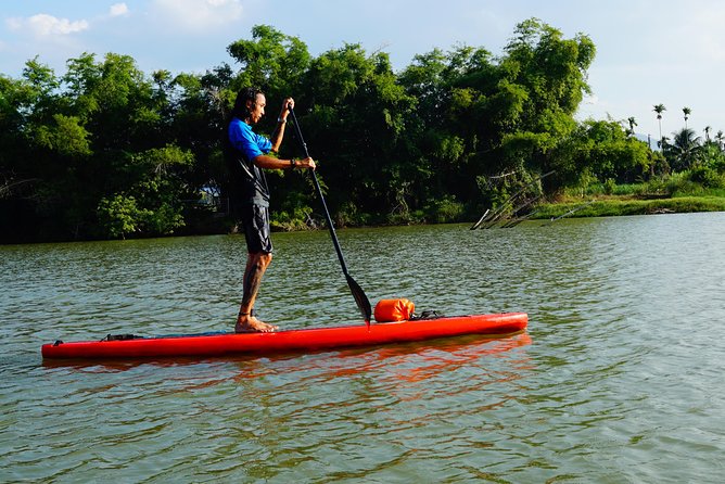 Stand Up Paddle Boarding and Sunset Watching on Cai River - Entering The SUP Scene at Vitamin Sea Homestay