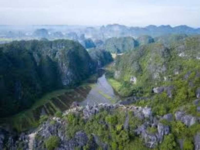 Sunset in Ninh Binh by Jeep (Trang An/Tam Coc pick up) - Hoa Lu Ancient Town’s two-part layout: products, then food