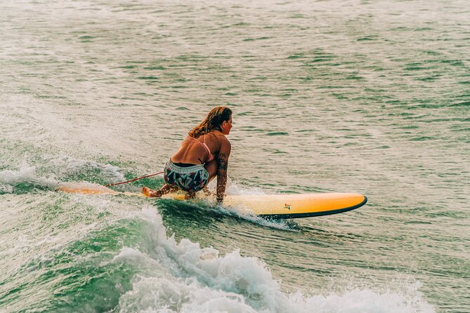 Surf in Vietnam with a local! - In the water: longboard waves and your first real attempts