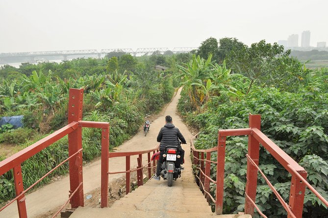 The Hidden Side Of Hanoi By Scooter - The first stops: St. Joseph’s Cathedral and train-track mural history
