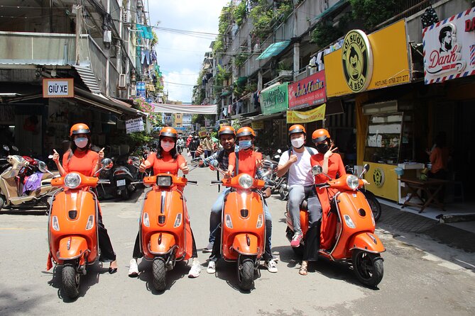 The Insider's Saigon With Female Ao Dai Riders Vespa 4,5 Hours - Lunch at a local restaurant: included, practical, and part of the point