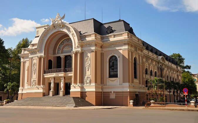 The Unique Ao Dai Street Food Tour By Scooter - Stop 1: Saigon Opera House start that sets the tone