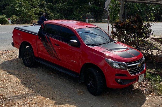 TranTran's Car rental English driver - The Chevrolet Colorado setup: four seats, big trunk, and clean comfort