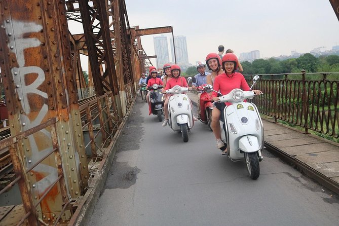 Vespa City Tour &Train Street Female With Ao Dai Riders 4,5 Hours - West Lake, Tran Quoc Pagoda, and a layered Hanoi walk