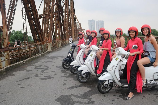 Vespa City Tour &Train Street Female With Ao Dai Riders 4,5 Hours - Suited up with helmets, masks, and raincoats