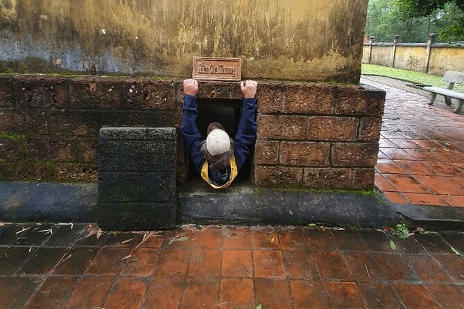 WAR TRAILS TOUR to KY ANH TUNNELS & CHAM RUINED SANCTUARY - Walking the dim passages with veteran stories
